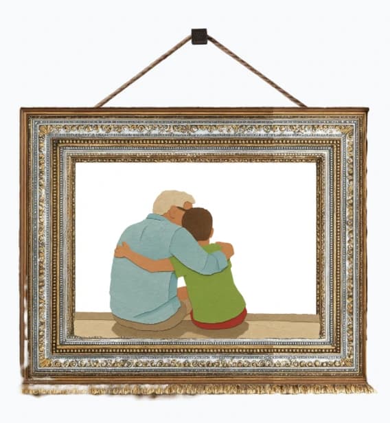 A framed picture of a grandparent and grandchild sitting together